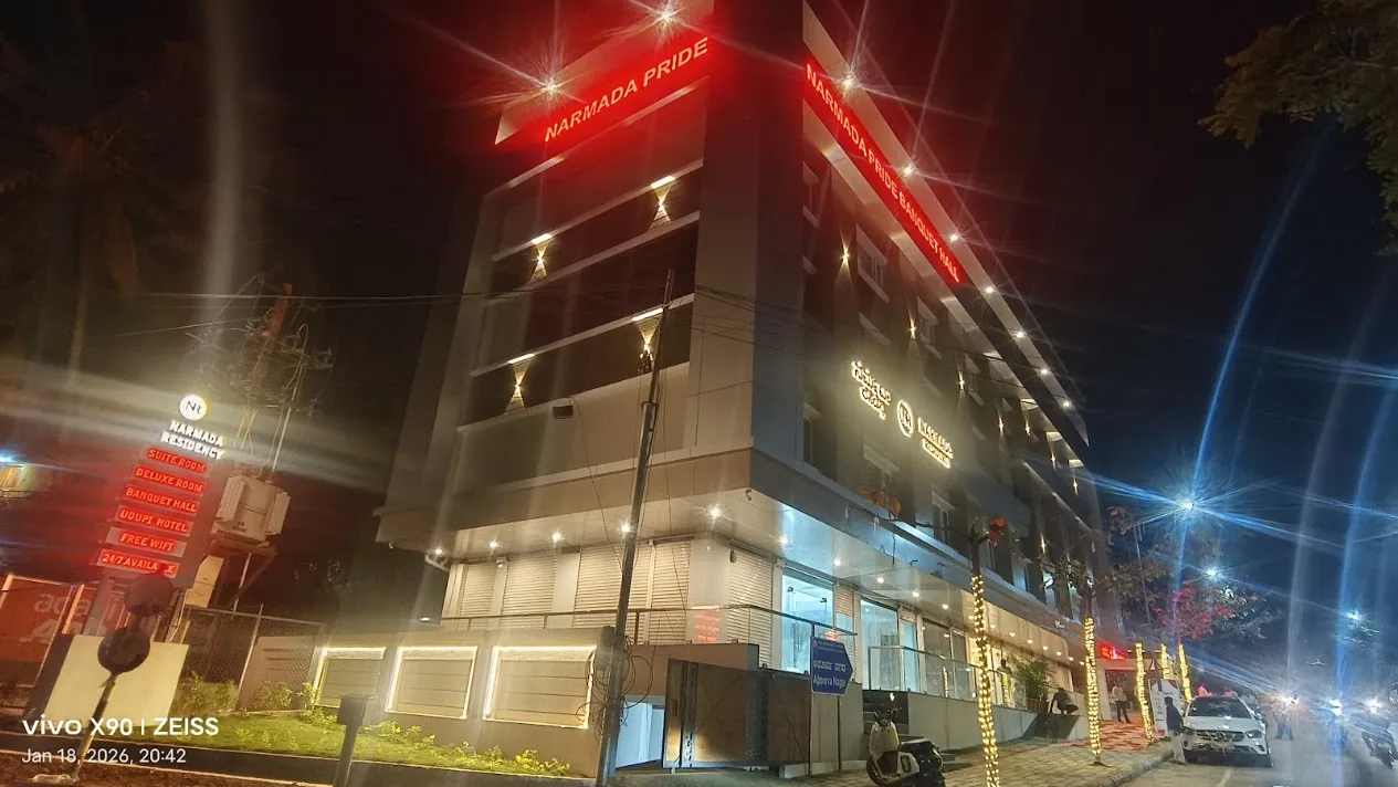 Exterior facade and signage lighting installed on a hotel building at night